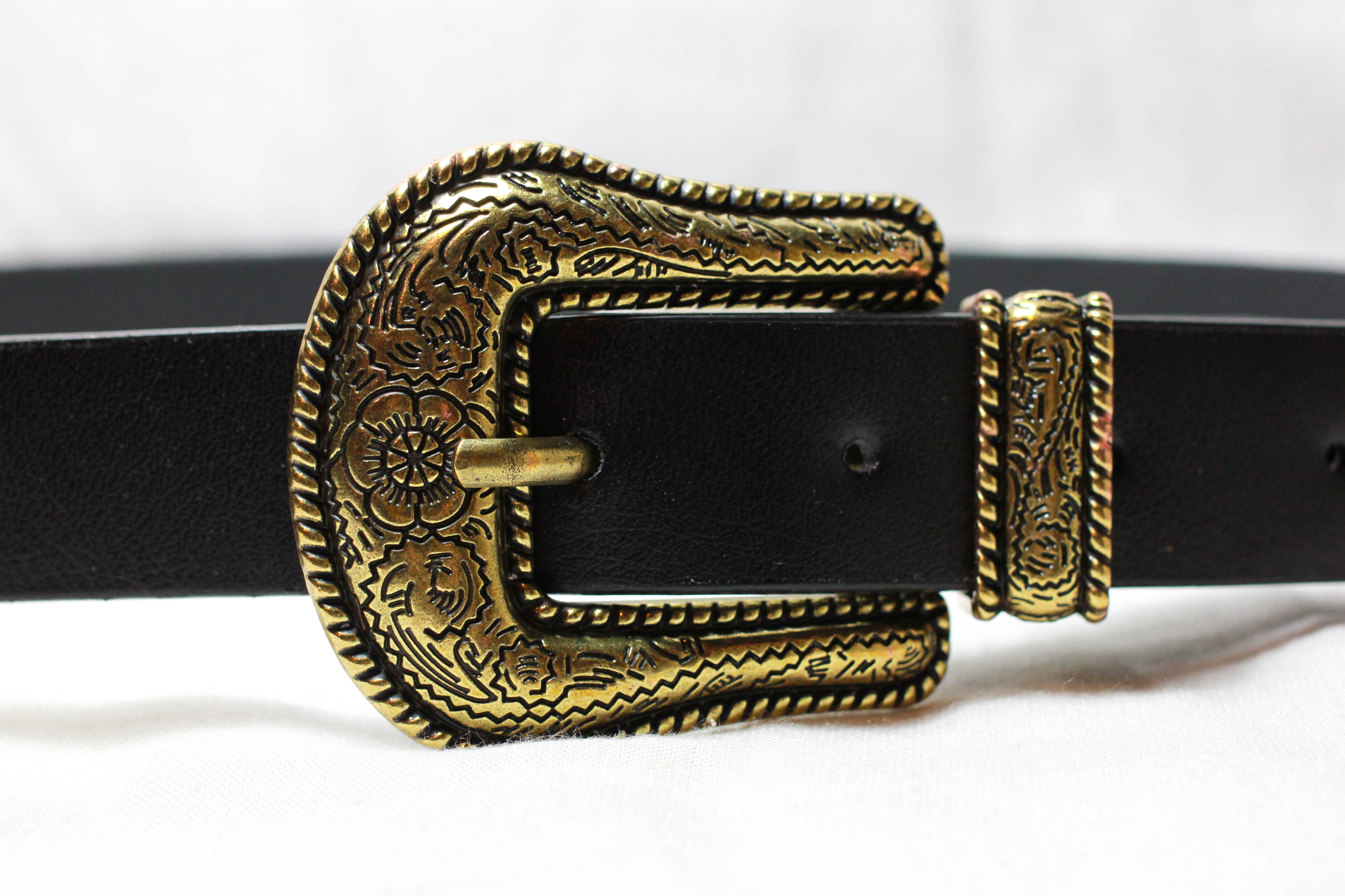 เข็มขัดสองหัวสีทอง หัวมลรูปดอกไม้ สายเรียบกว้าง 1 นิ้ว