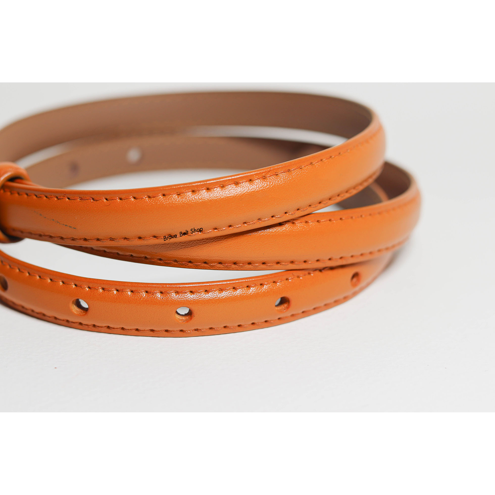 เข็มขัดแฟชั่นผู้หญิงสีน้ำตาลส้ม เส้นเล็กน่ารัก