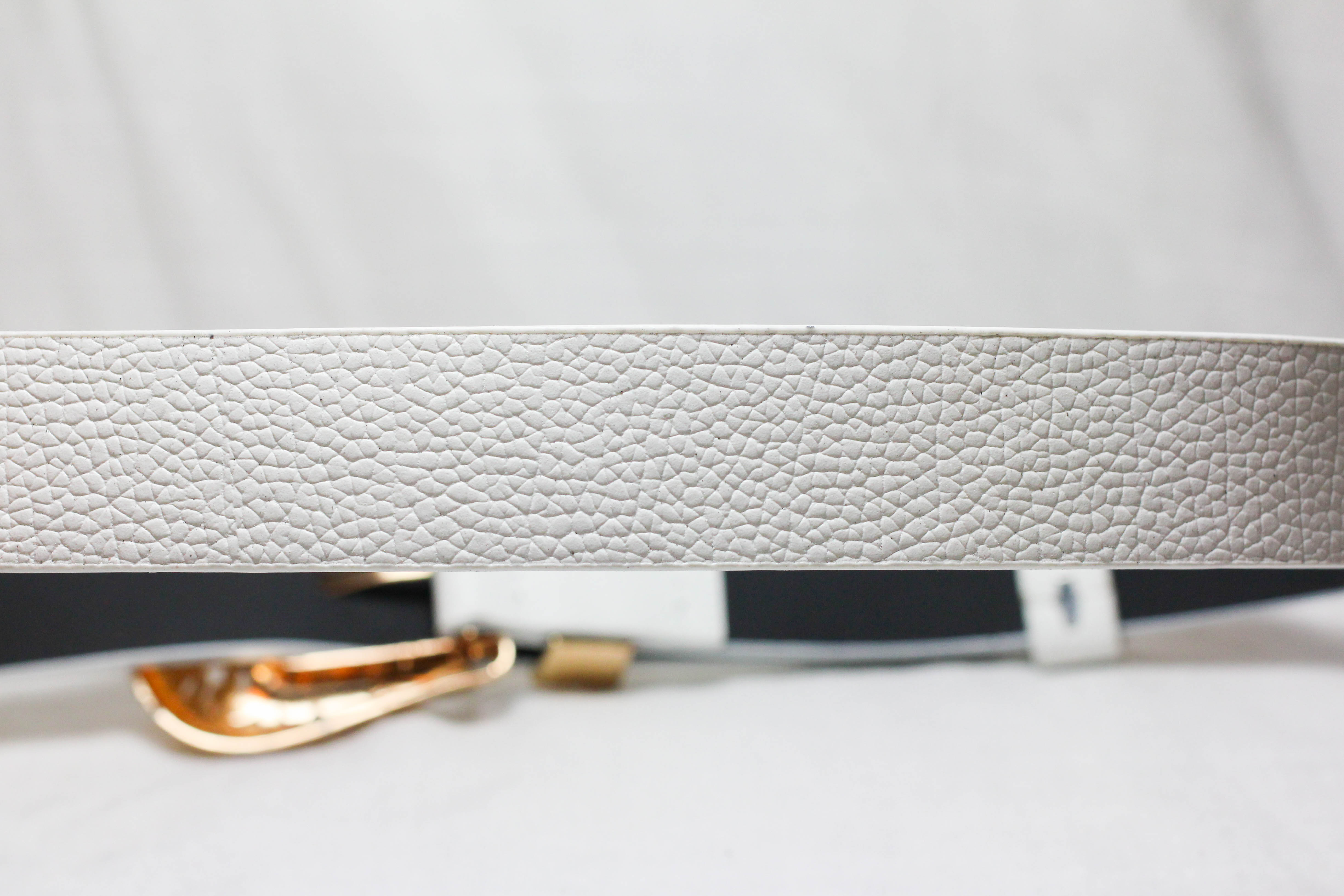 เข็มขัดสองหัวสายขาว หัววินเทจสีทองสวย