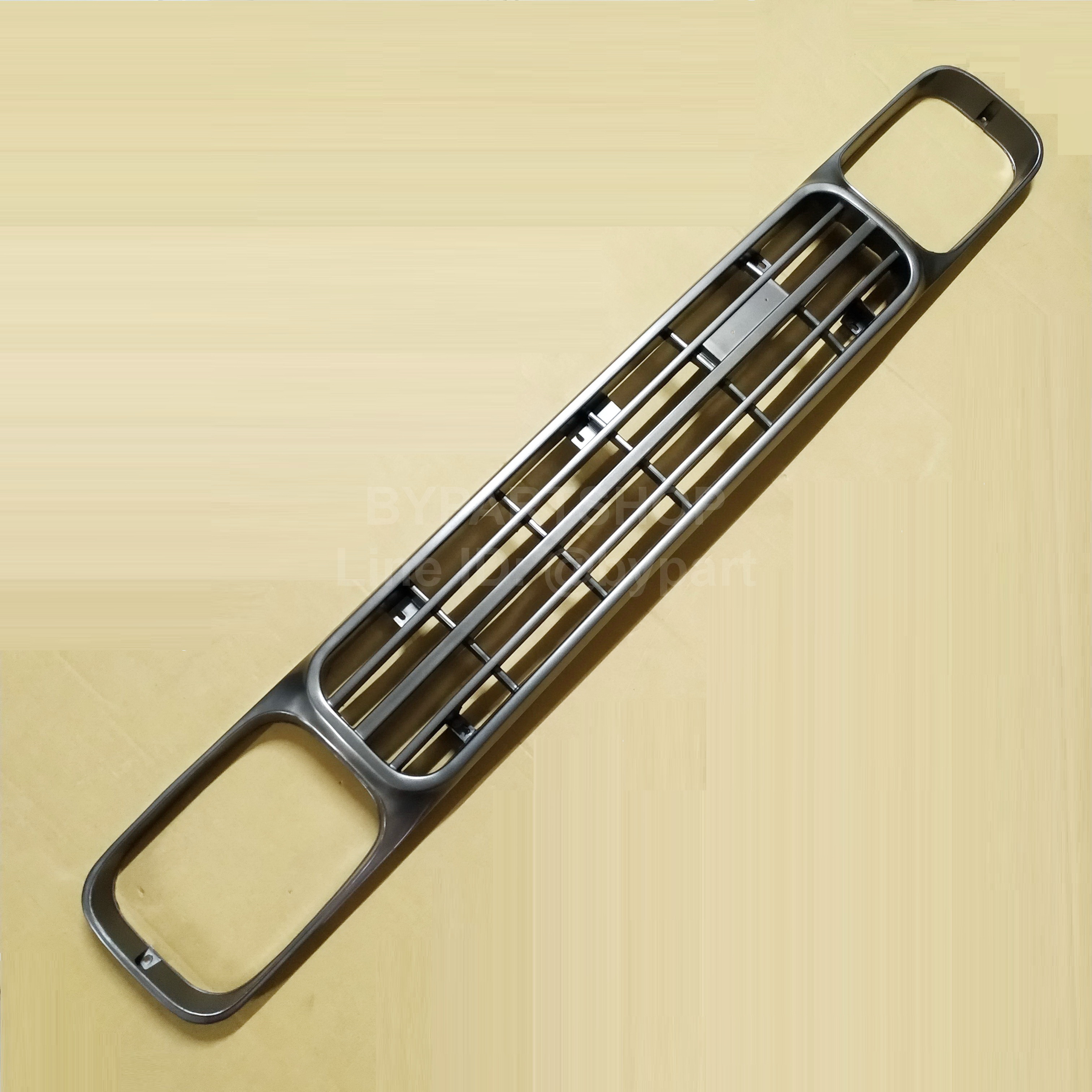 หน้ากระจัง MAZDA FAMILIA(แฟมิลี่) M1400 สีเทาเข้ม ตามรูป (ใส่ M1300 ได้ด้วย) ไม่มีโลโก้ (รหัส:M1400)