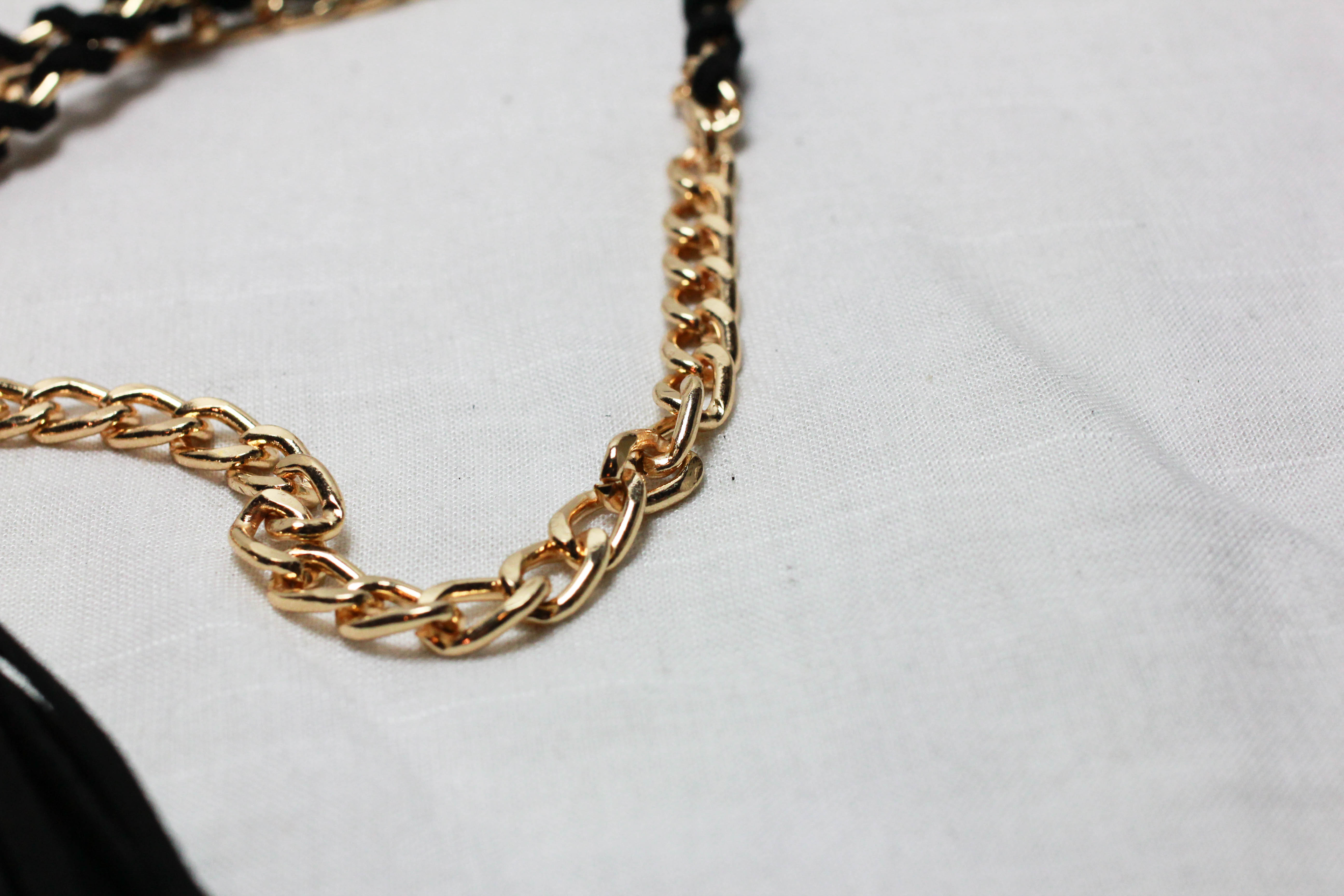 เข็มขัดแฟชั่น แนวเชือกปลายมีพู่ สีดำขอบทองสวย