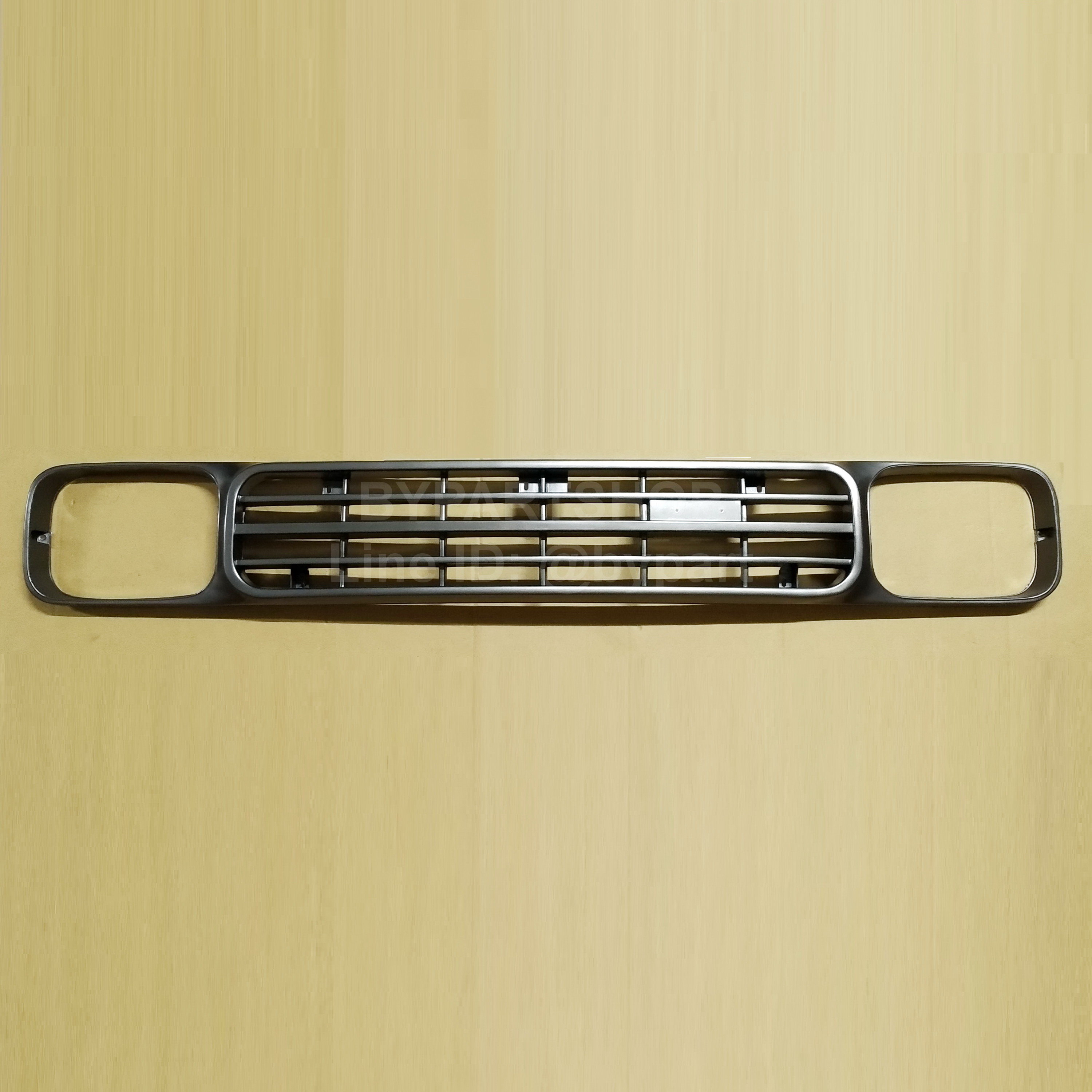 หน้ากระจัง MAZDA FAMILIA(แฟมิลี่) M1400 สีเทาเข้ม ตามรูป (ใส่ M1300 ได้ด้วย) ไม่มีโลโก้ (รหัส:M1400)