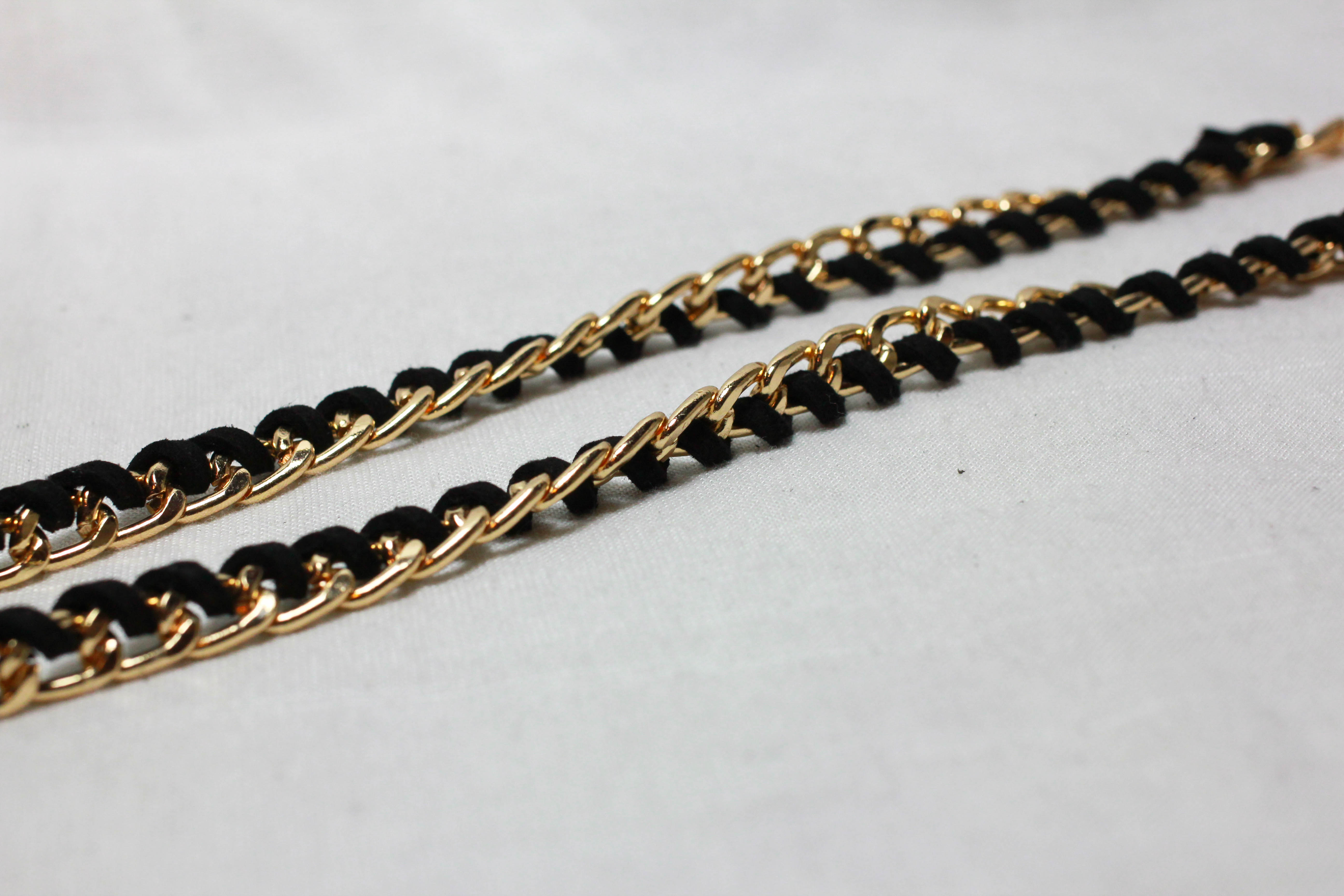 เข็มขัดแฟชั่น แนวเชือกปลายมีพู่ สีดำขอบทองสวย