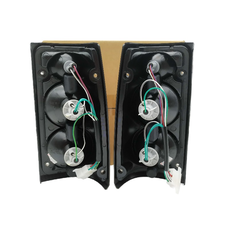 ไฟท้ายแต่ง ISUZU TFR(มังกร) รุ่นไฟโดนัท-ใสขาว ปี1990-1996 (ครบชุดคู่, งานแท้DEPO)