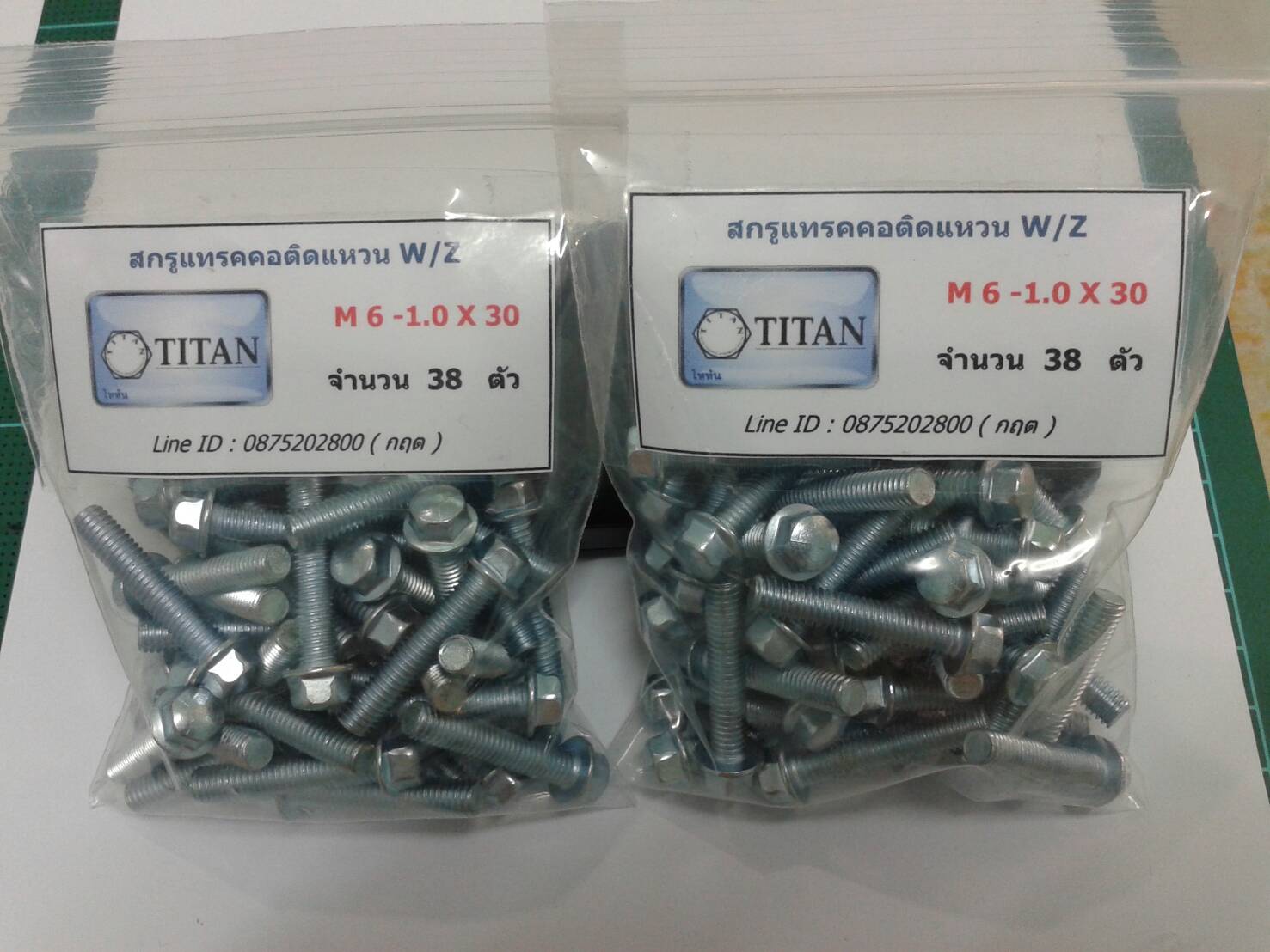 สกรูแทรค คอติดแหวน M 6-1.0 - ชุปขาว ( HEX HEAD FLANGE BOLT )