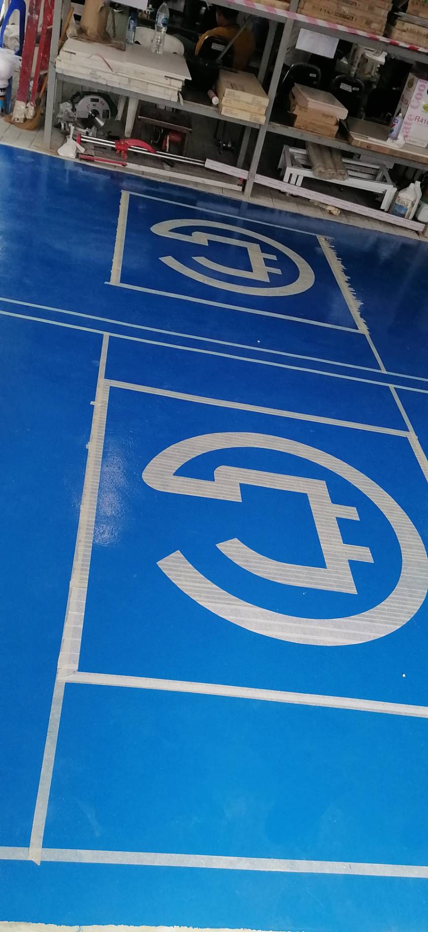 ทาสีช่องจอดรถคนพิการ