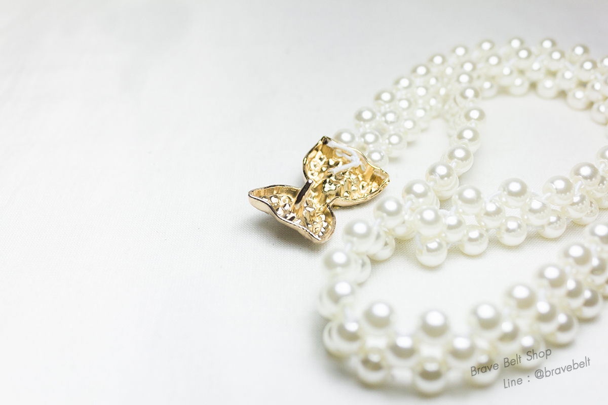 เข็มขัดไข่มุกใส่ออกงาน หัวรูปโบว์สีทองมีเพชรประดับ