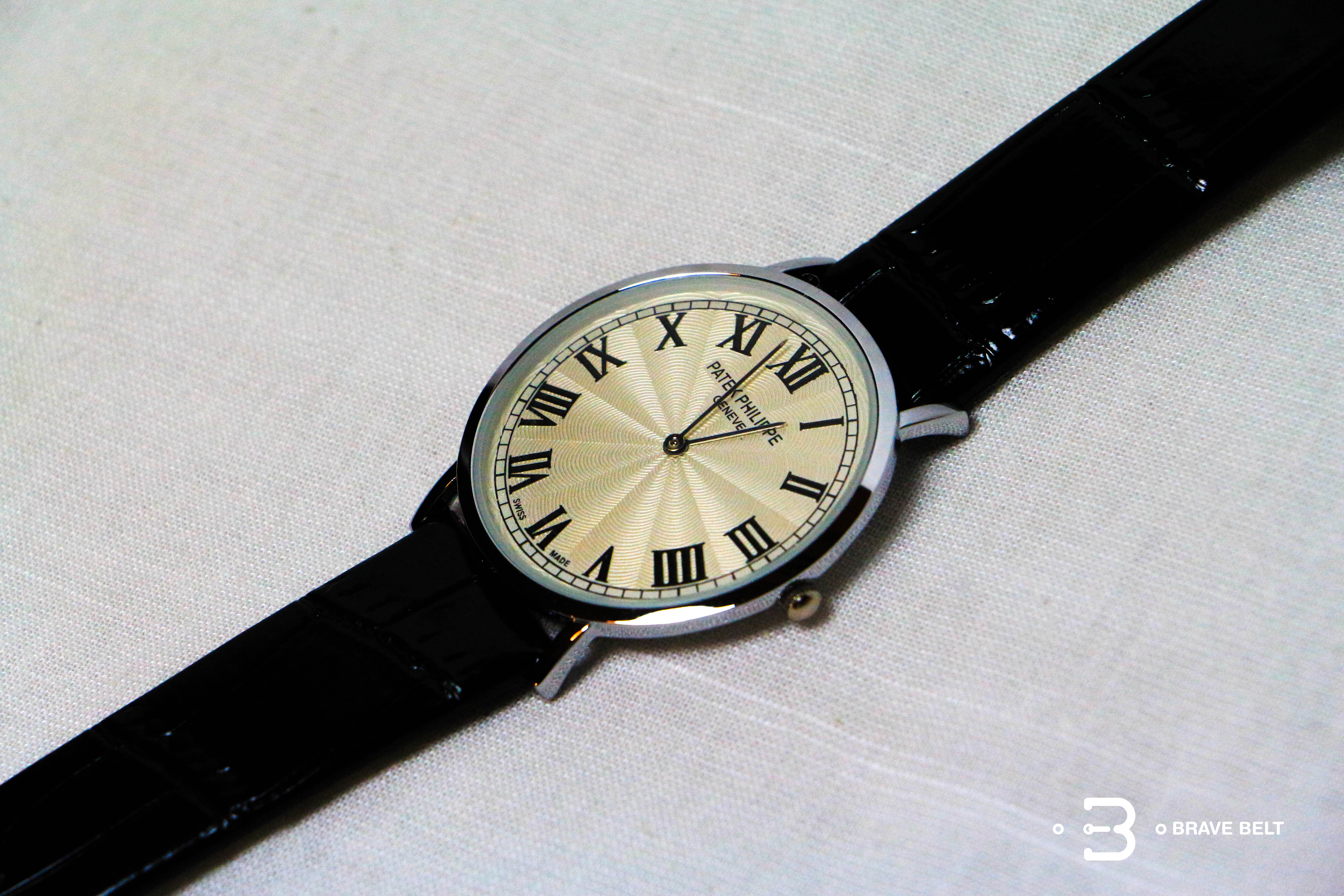 นาฬิกา patek philippe หน้าปัดทอง เลขโรมัน ขอบสีเงิน