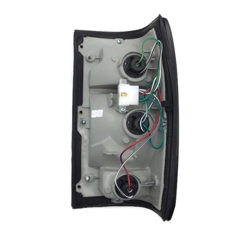 ไฟท้าย MAZDA MAGNUM(แม็กนั่ม)-THUNDER(ธันเดอร์)-FIGHTER(ไฟเตอร์)ปี97 โฉมแรก ขอบดำ พร้อมขั้ว+หลอด (งานแท้ DEPO) -ราคาต่อดวง-