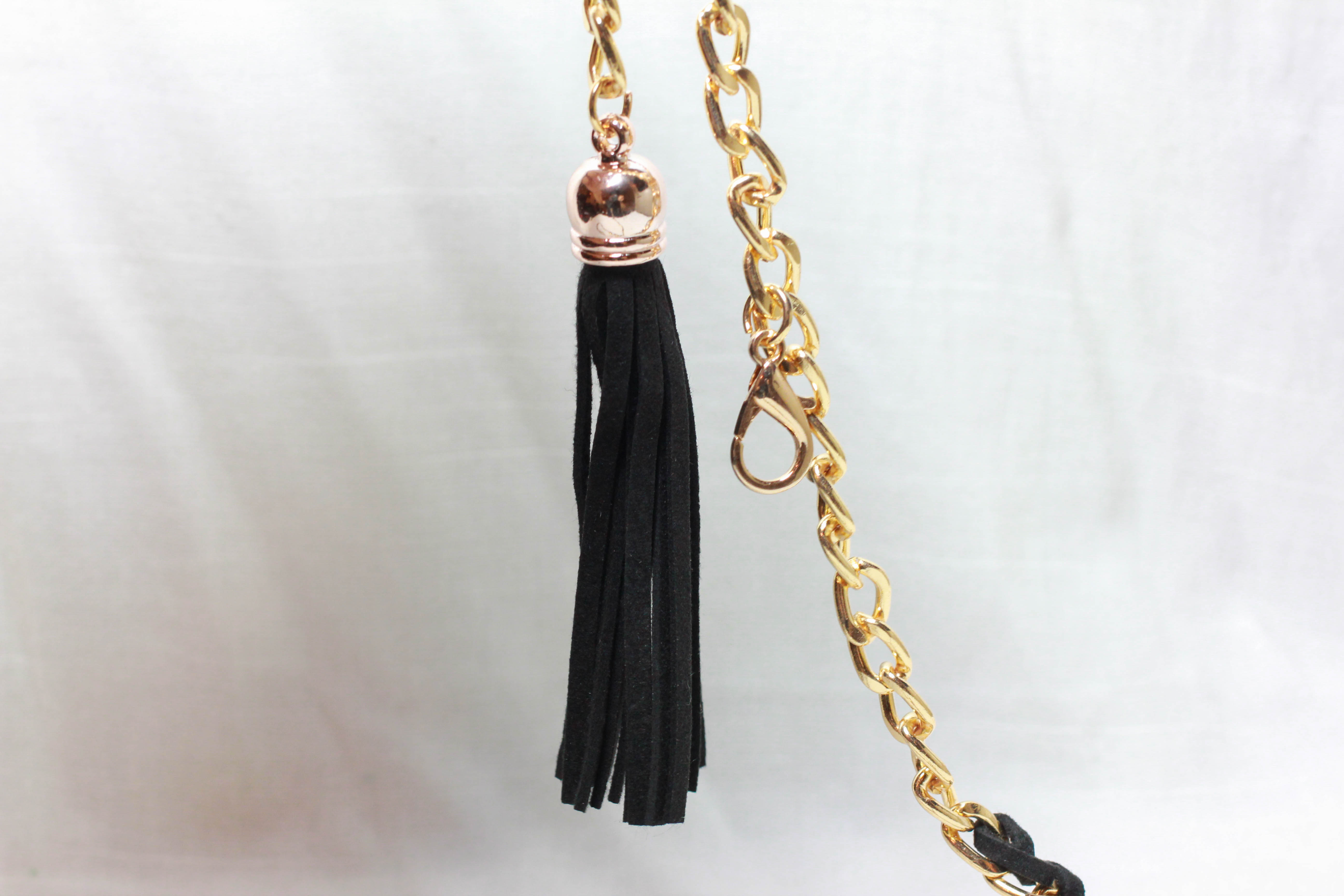 เข็มขัดแฟชั่น แนวเชือกปลายมีพู่ สีดำขอบทองสวย