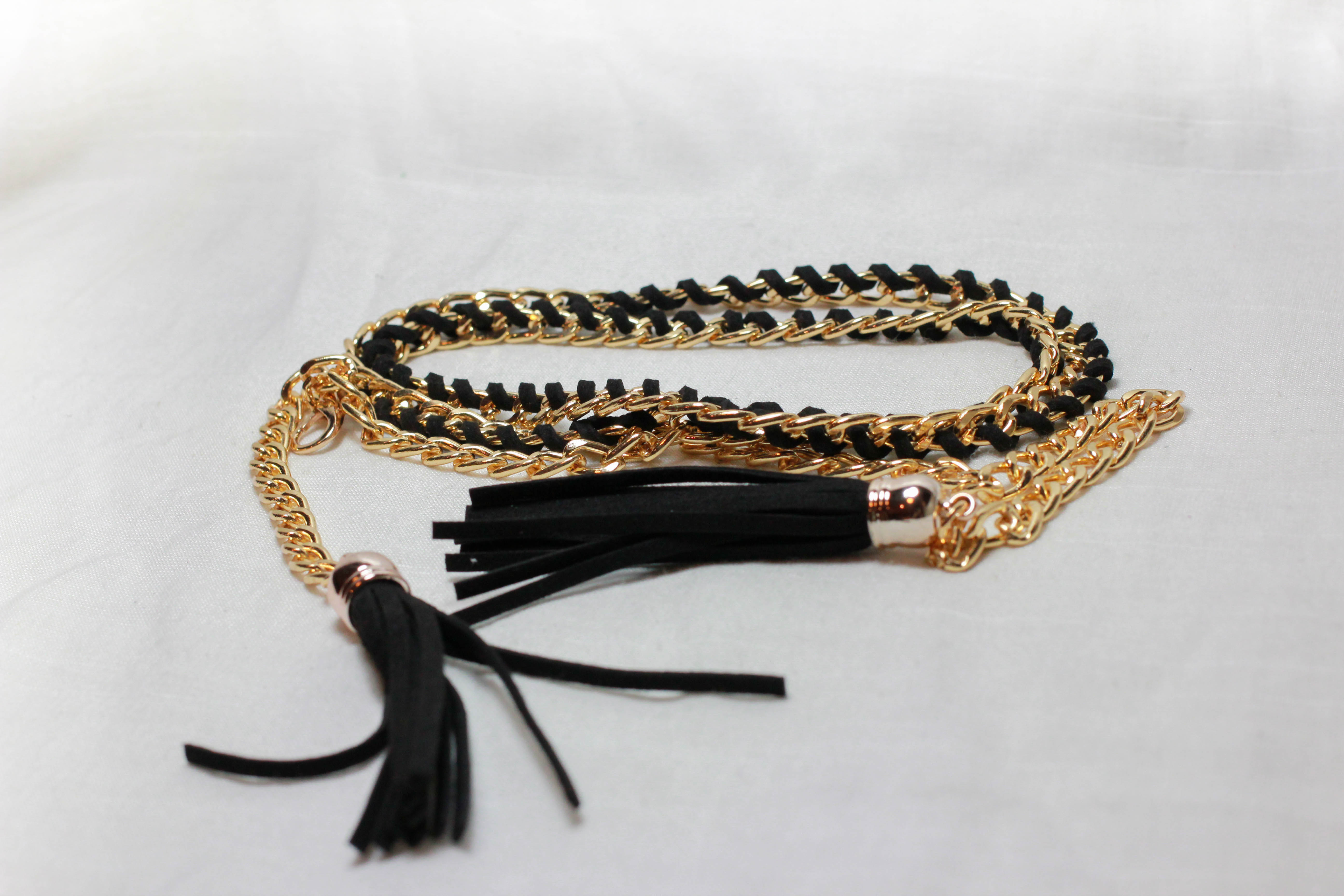 เข็มขัดแฟชั่น แนวเชือกปลายมีพู่ สีดำขอบทองสวย