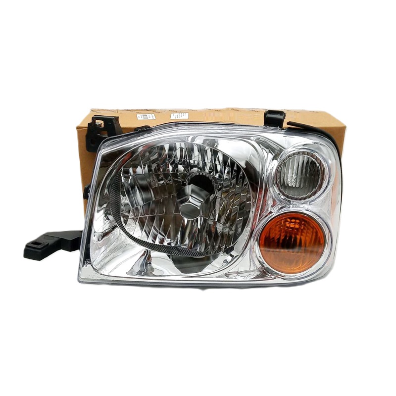 ไฟหน้า NISSAN FRONTIER(ฟรอนเทียร์) โฉมตาการ์ตูน มุมส้ม ปี2001-2006 (งานแท้ TYC) -ราคาต่อดวง-