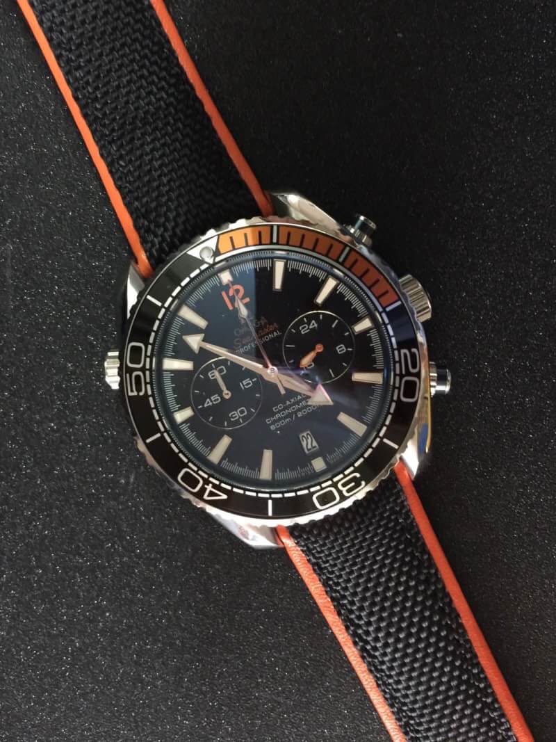 นาฬิกา Omega รุ่น Seamaster Planet Ocean Chronograph สีเงิน สายหนังสีดำขอบส้ม 600M Co-Axial Master Chronometer Basel