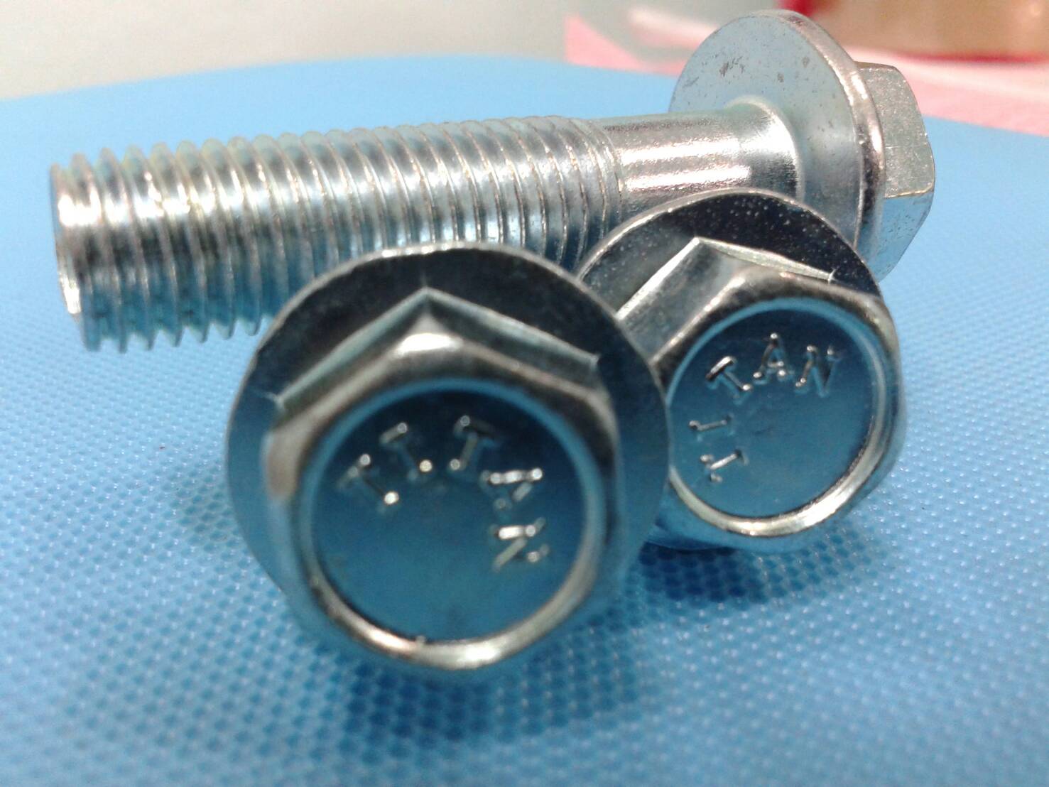 สกรูแทรค คอติดแหวน M 10 - 1.25 ชุปขาว ( HEX HEAD FLANGE BOLT )