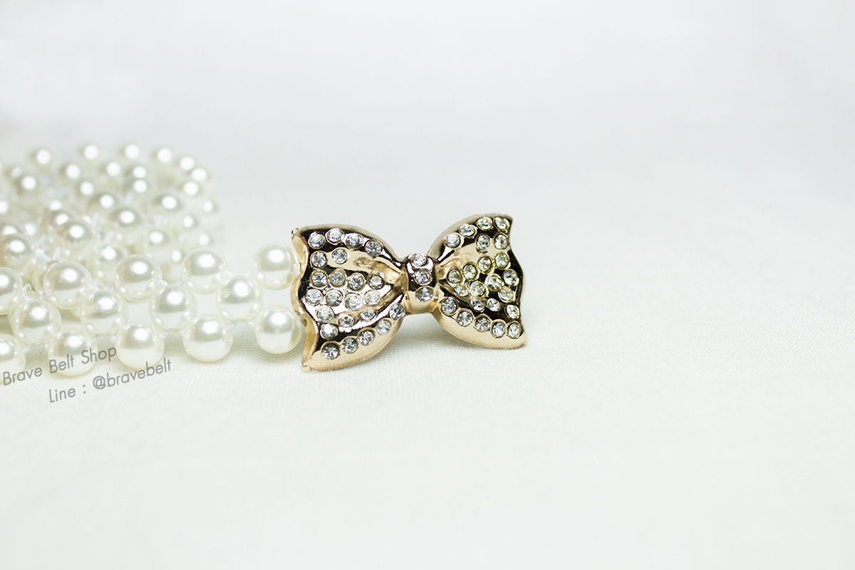 เข็มขัดไข่มุกใส่ออกงาน หัวรูปโบว์สีทองมีเพชรประดับ