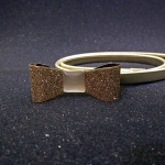 เข็มขัดแฟชั่นผู้หญิง สายโซ่สีทอง หัวรูปโบว์ประกายเพชร