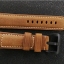 สายนาฬิกา Panerai แบบสายหนังแท้สีน้ำตาล มีปั้มโลโก้ทุกจุด ด้านในสาย และลงเลเซอร์ยี่ห้อชัดเจน