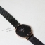 Daniel Wellington หน้าปัดดำ ขอบทอง สายสแตนเลส